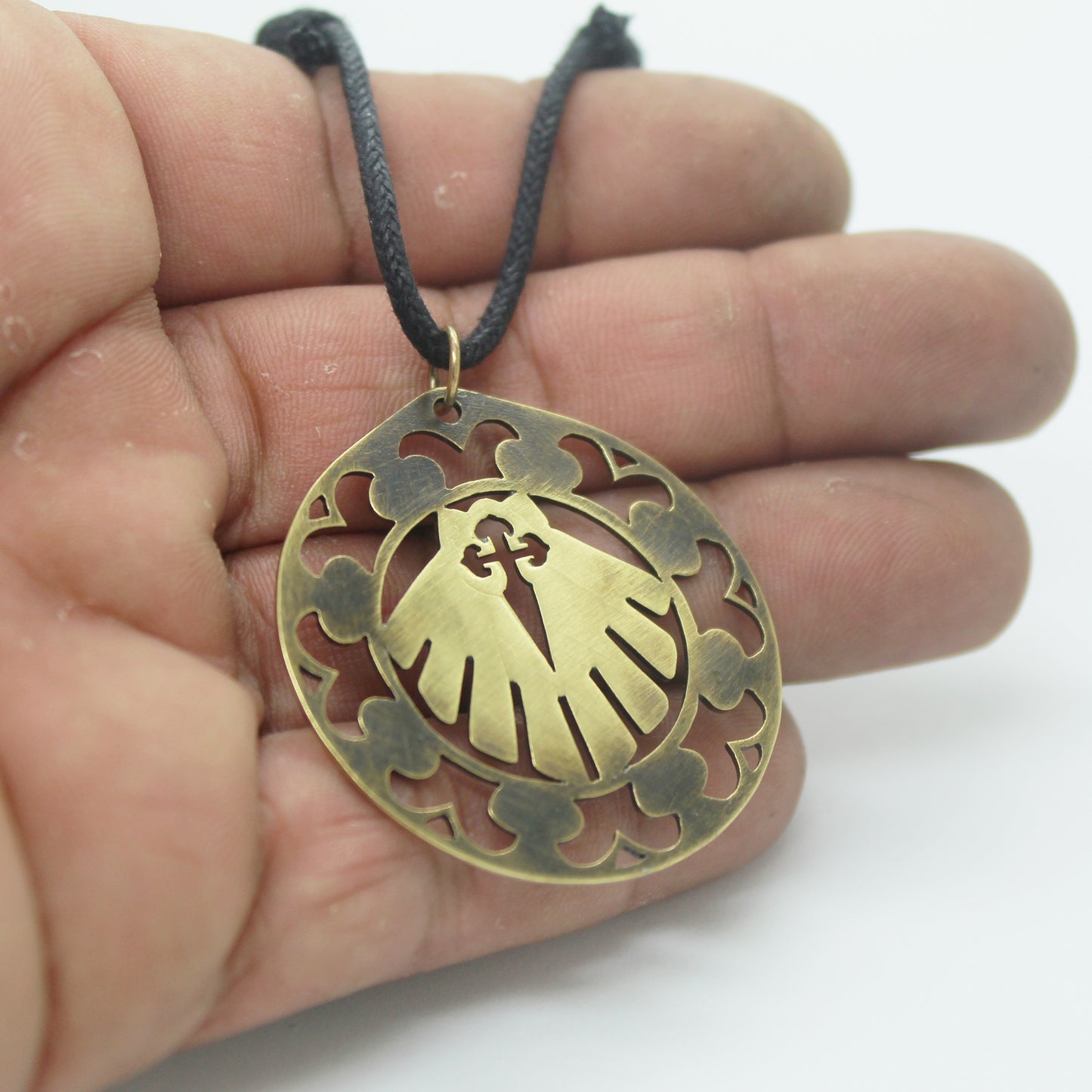 Shell medallion of the Camino and Cross of Santiago openwork in brass