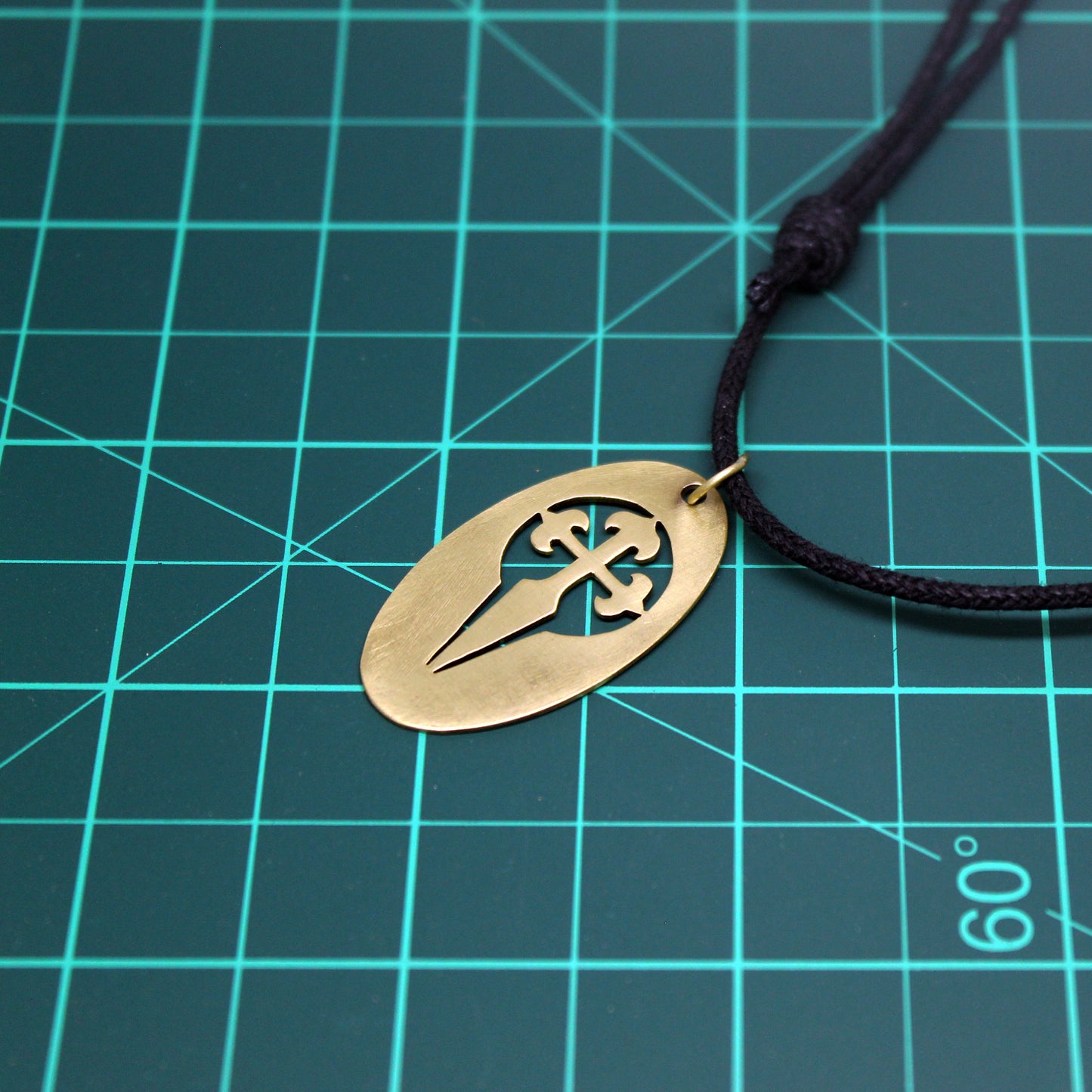 Oval medal with Cross of Santiago, brass pendant