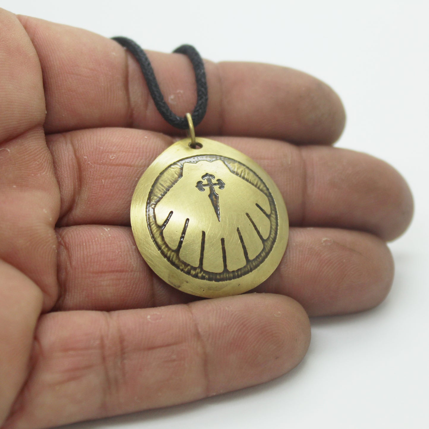 Engraved Camino de Santiago shell, brass pendant