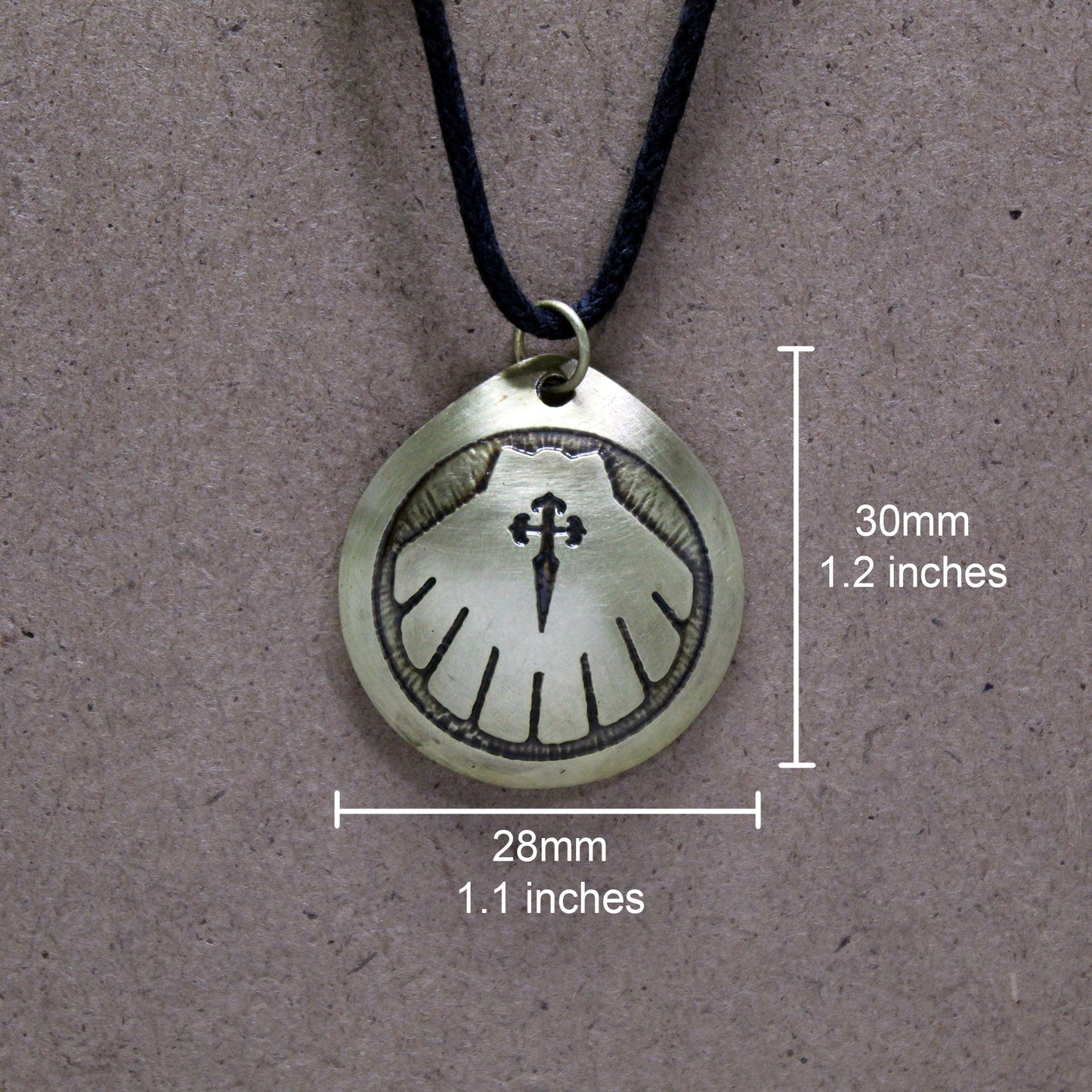 Engraved Camino de Santiago shell, brass pendant