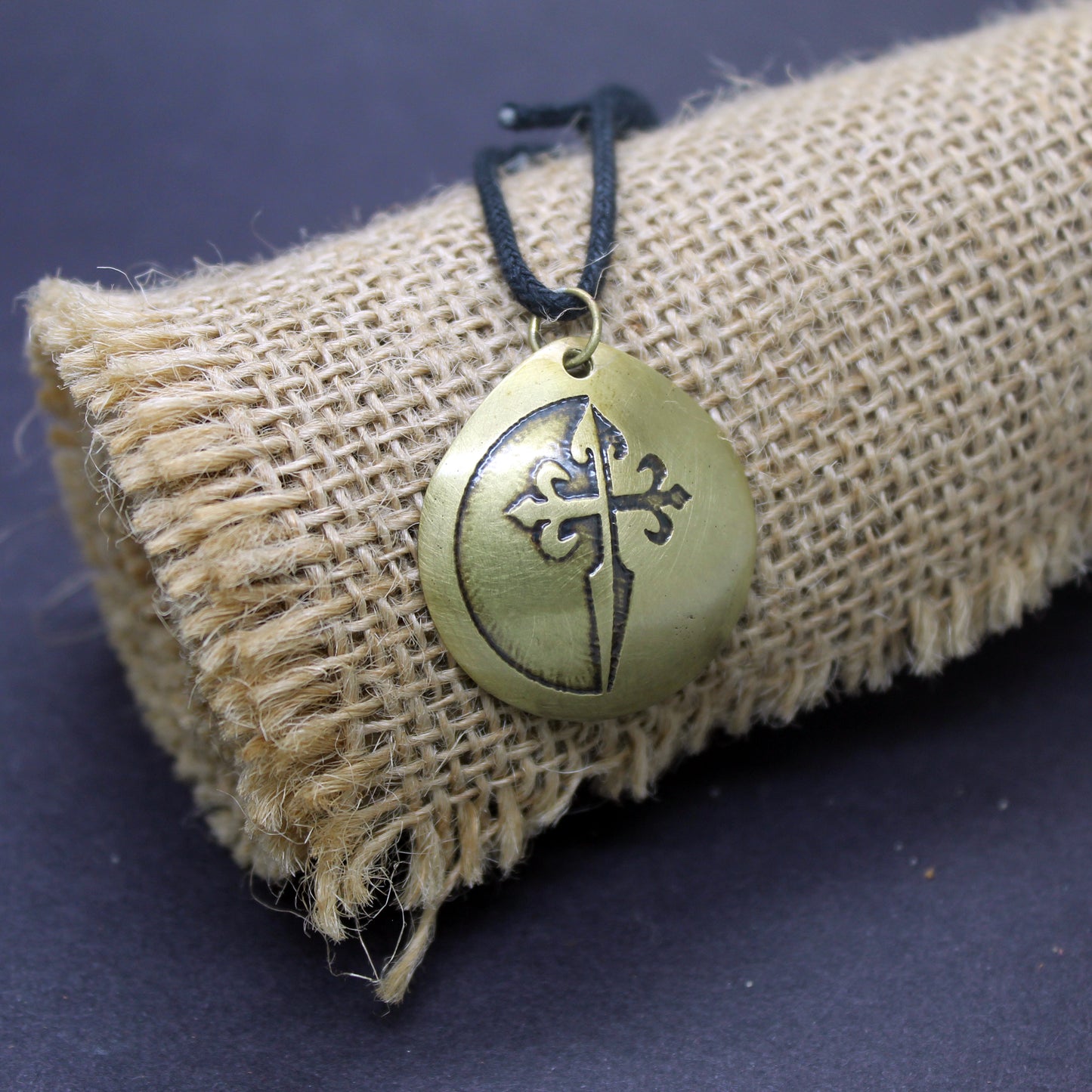 Cross of Santiago, convex brass pendant