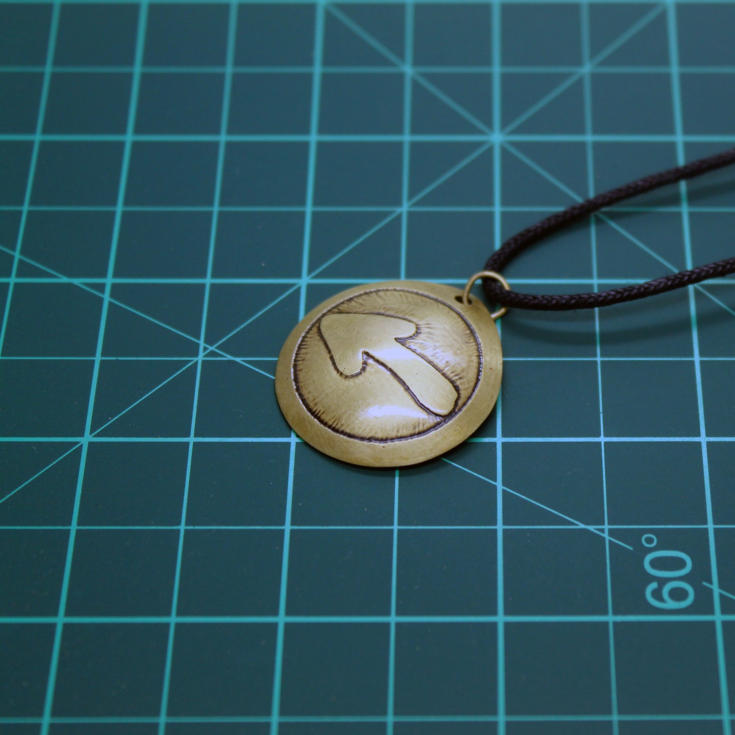 Arrow of the Camino de Santiago, brass pendant