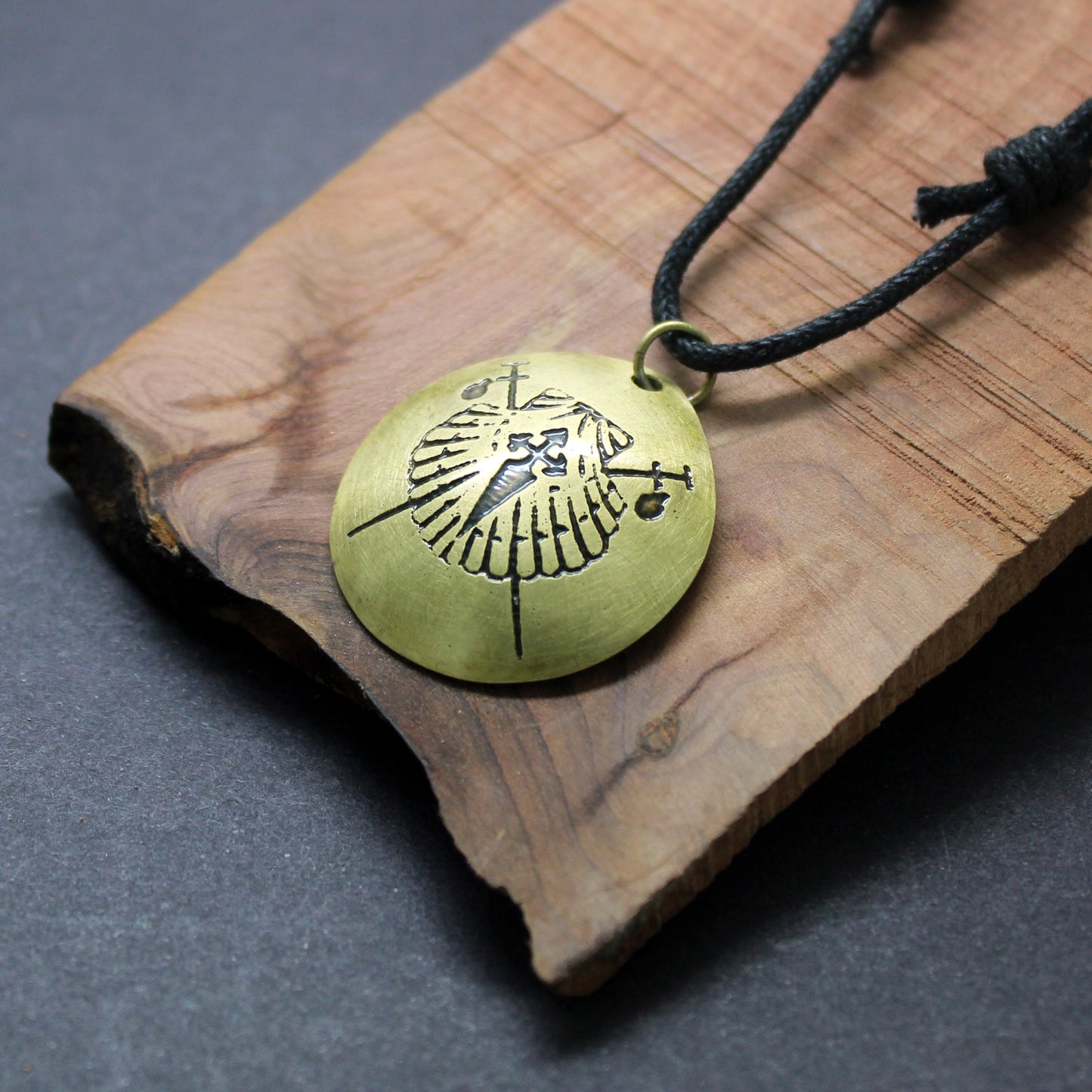 Symbols of the Camino de Santiago, convex brass pendant