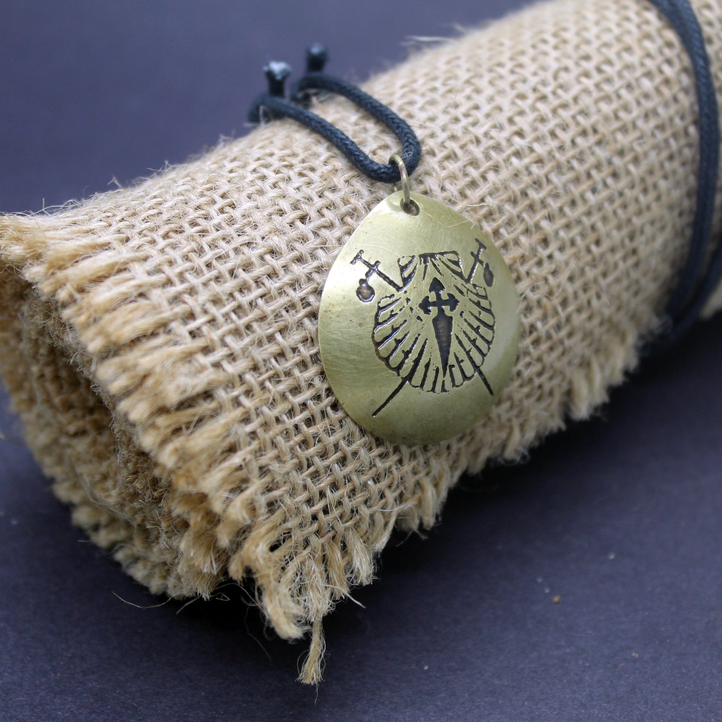 Symbols of the Camino de Santiago, convex brass pendant