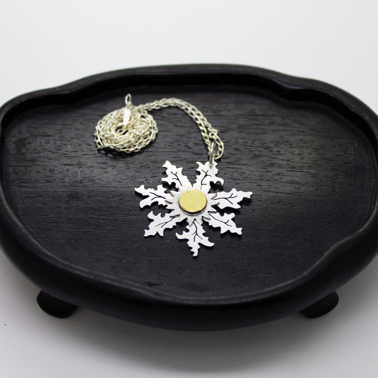 Eguzkilore pendant in 925 silver and brass