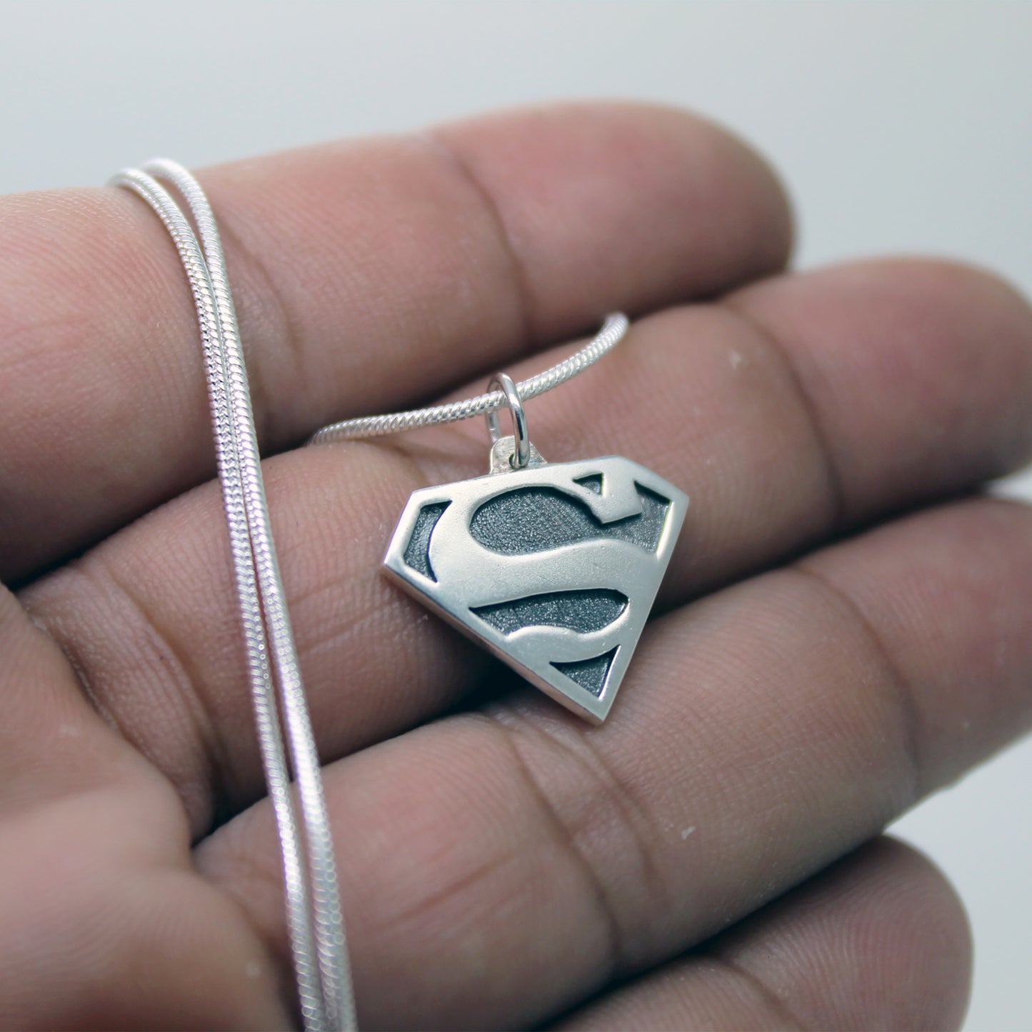 Colgante Superman / Supergirl en plata 925