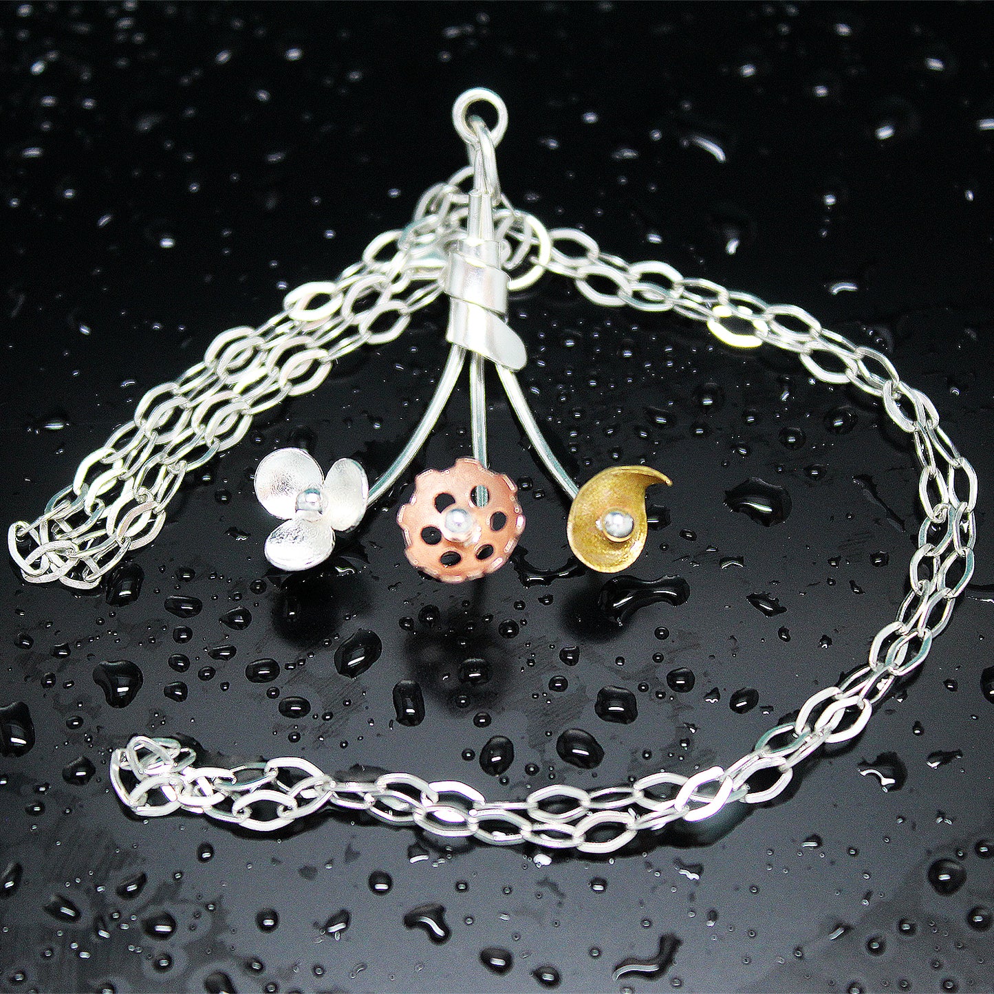 El Colgante de Susanne en plata 925, latón y cobre