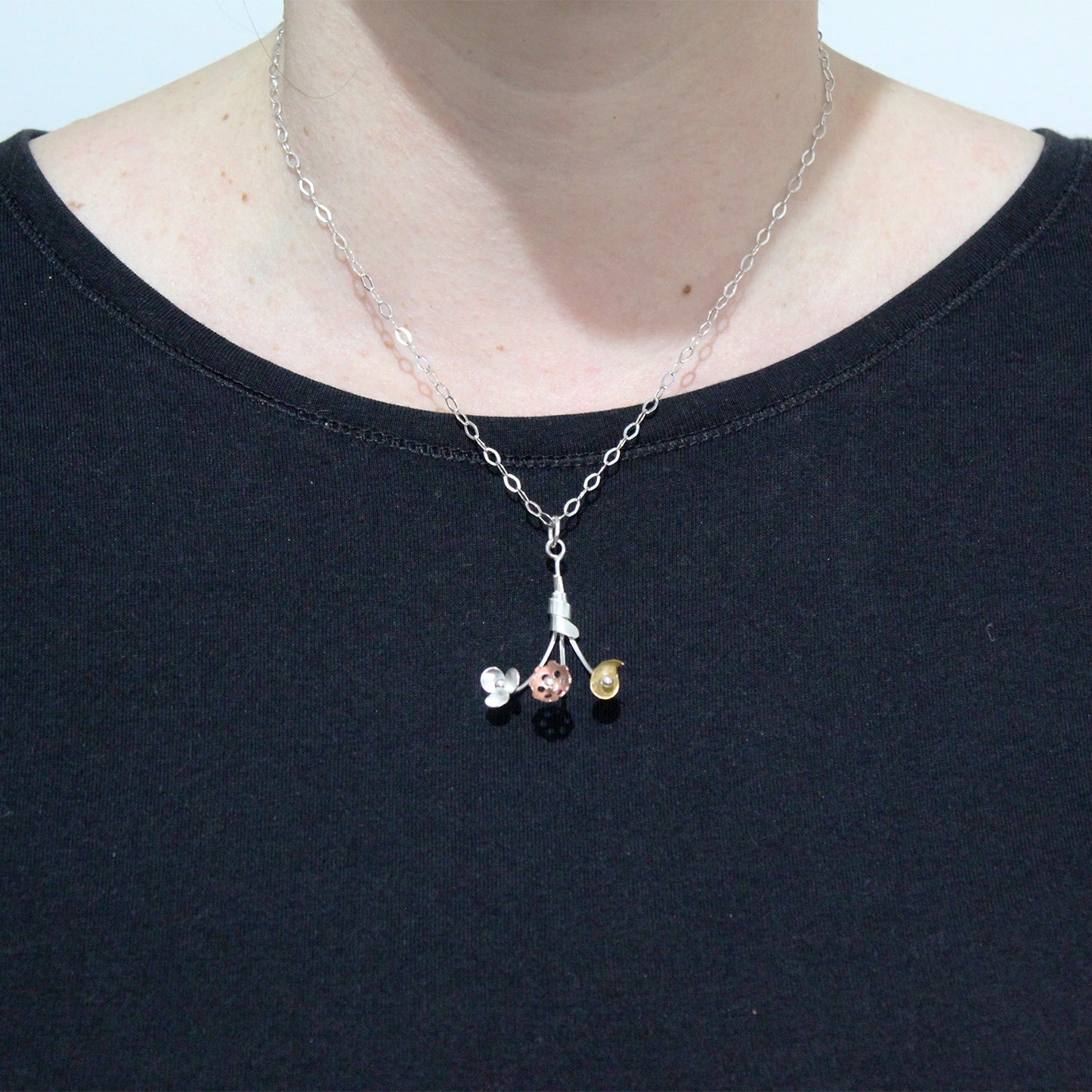 El Colgante de Susanne en plata 925, latón y cobre