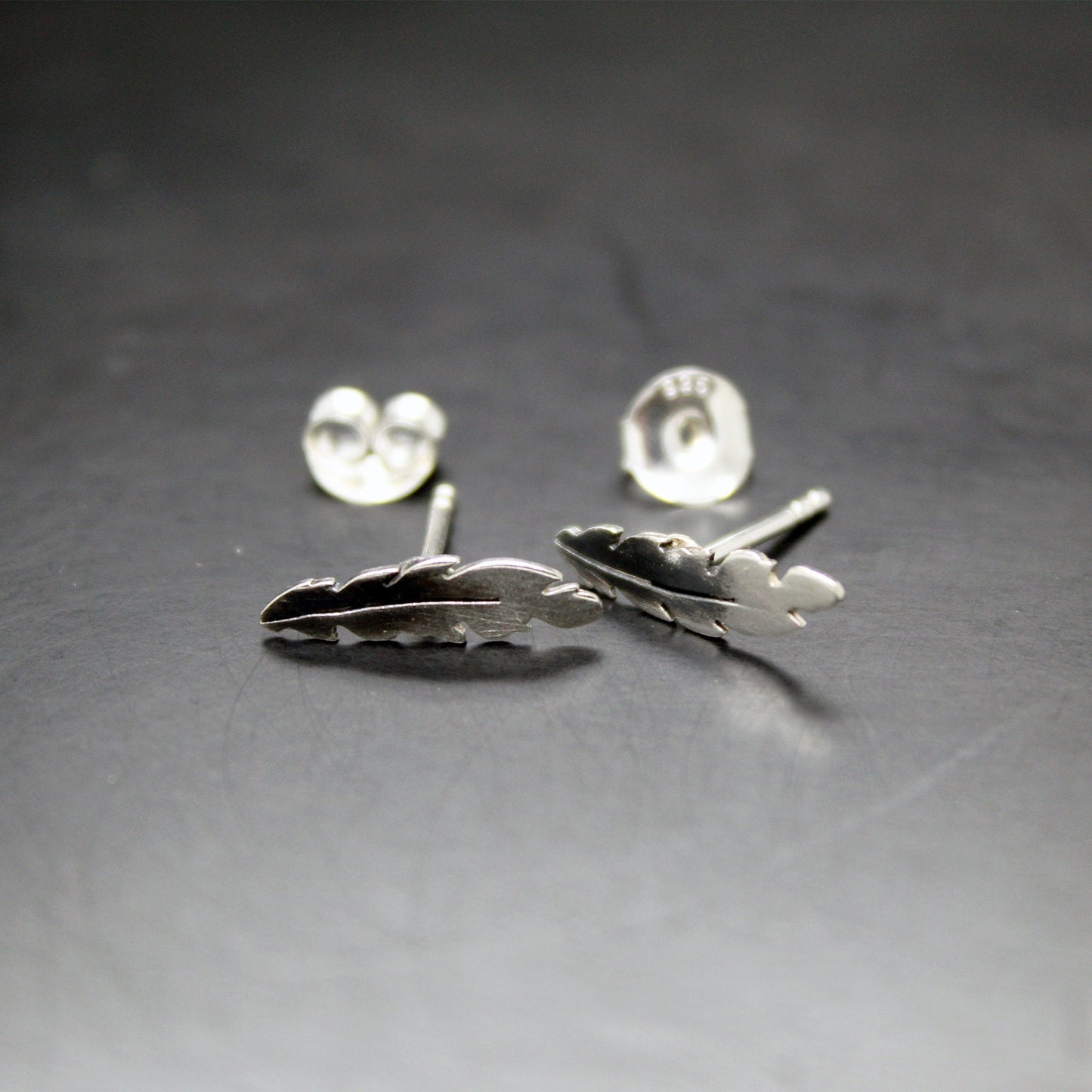 Small 925 silver feather earrings
