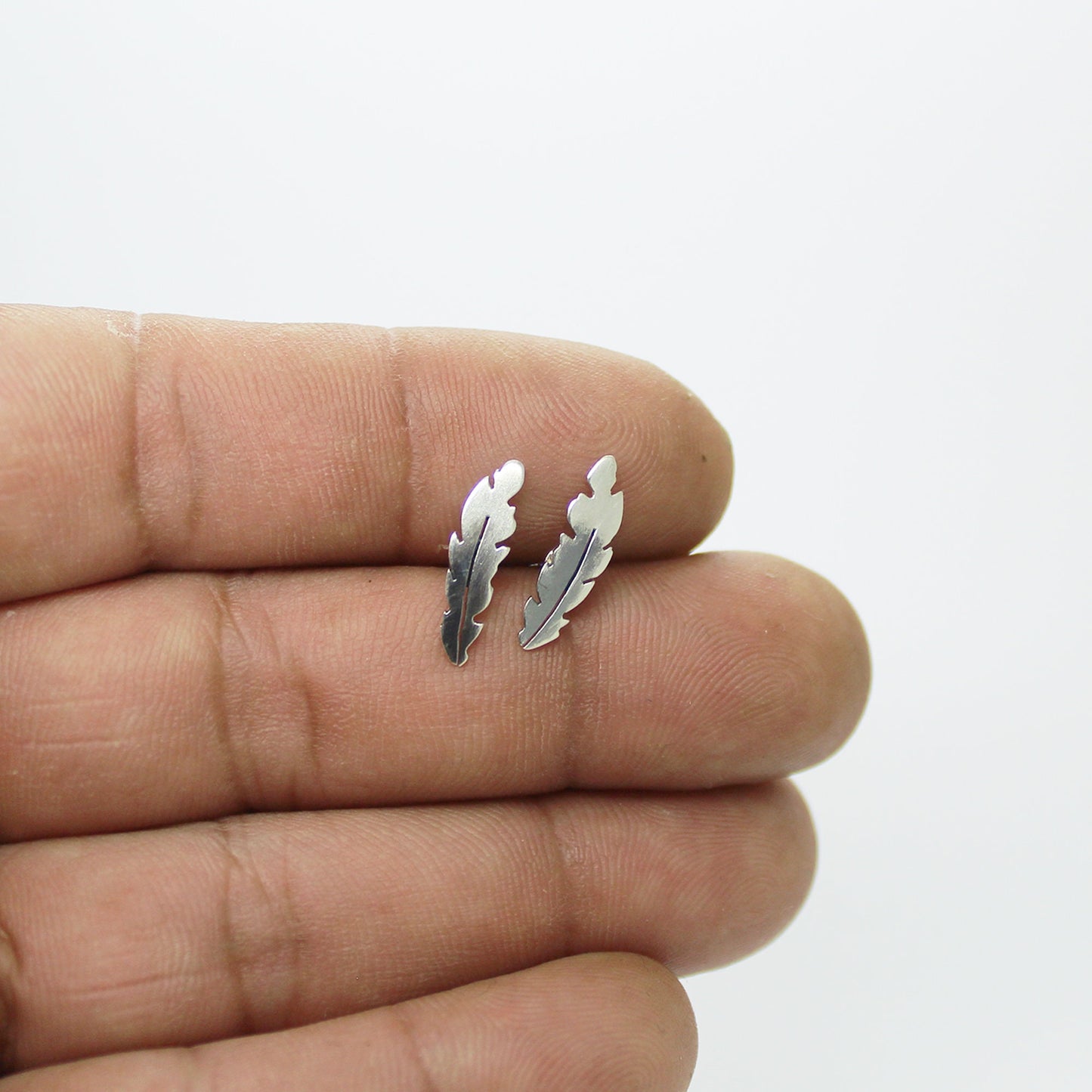 Small 925 silver feather earrings