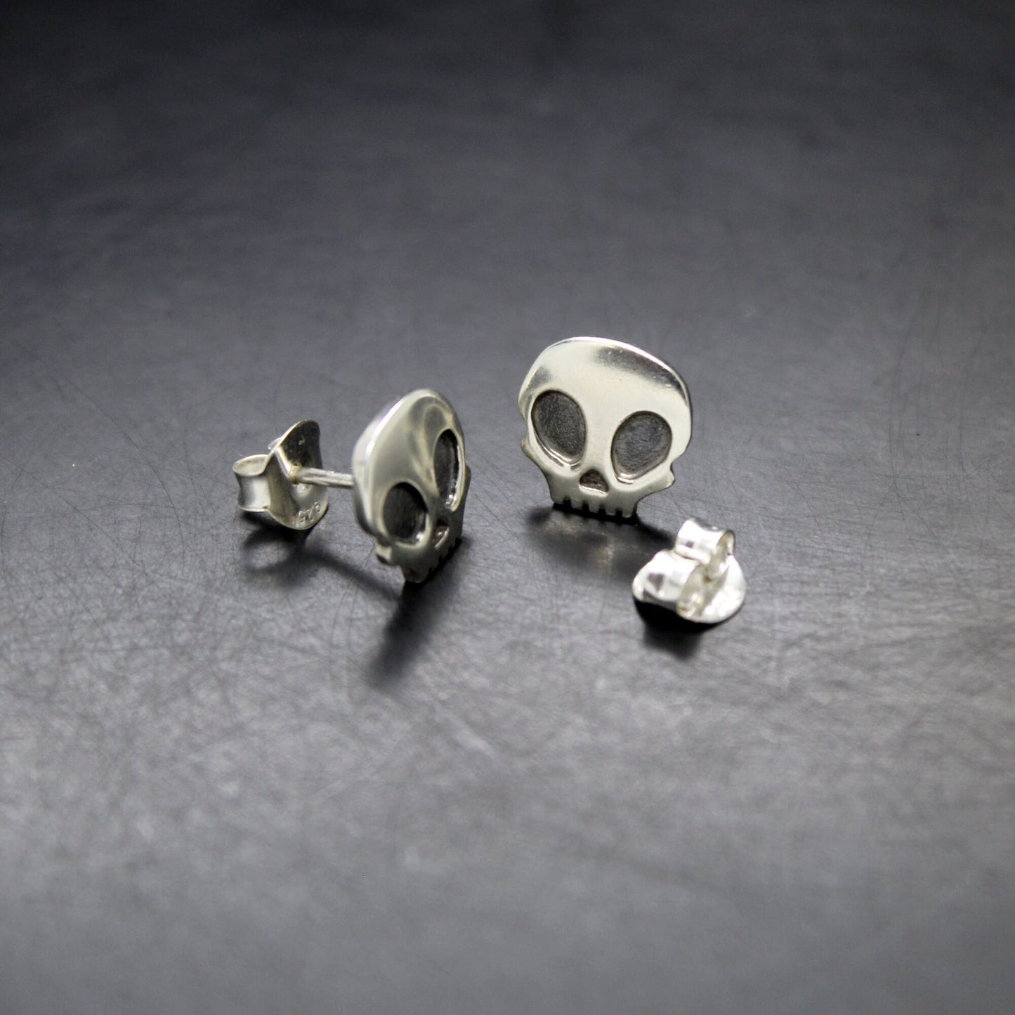 925 silver skull earrings with patina
