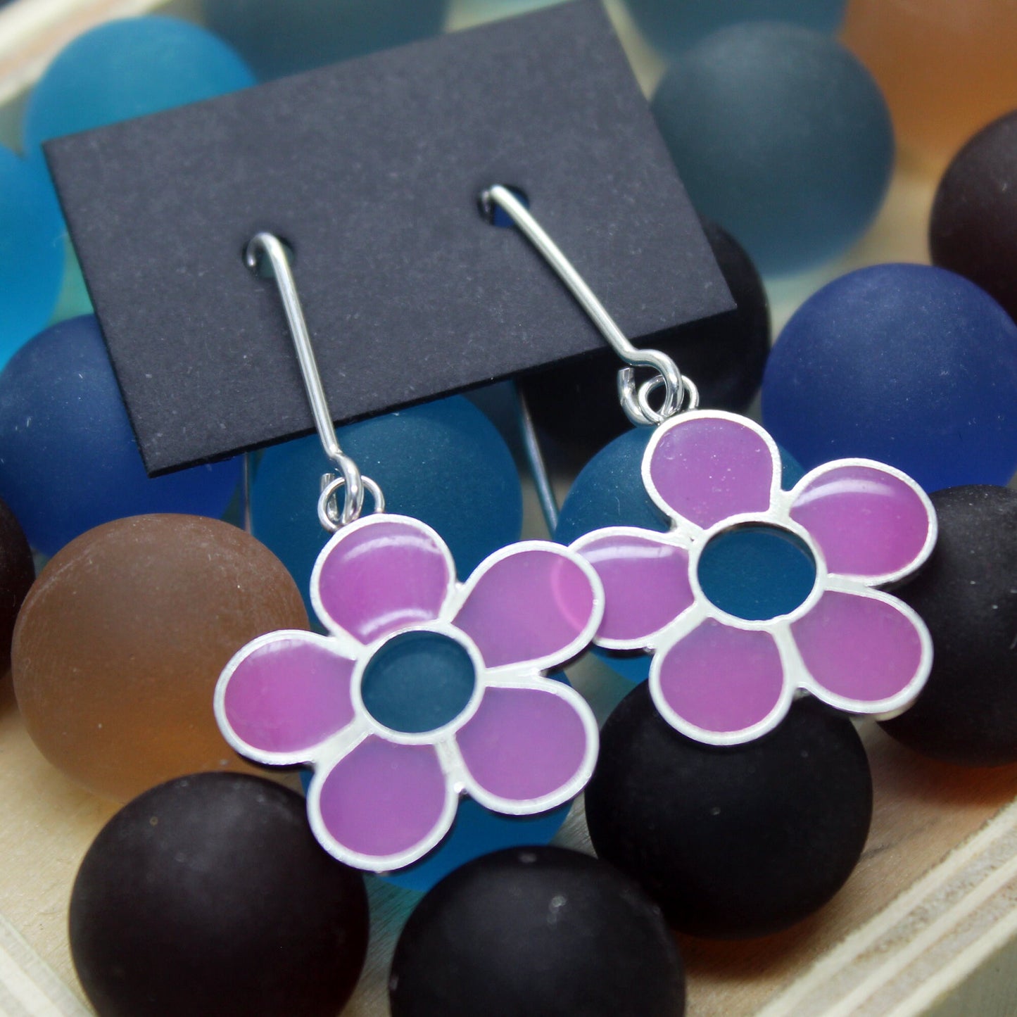 Flores lilas pendientes en plata 925