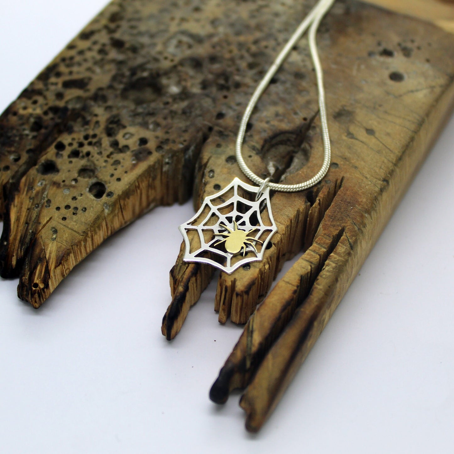 925 silver spider web pendant with brass spider