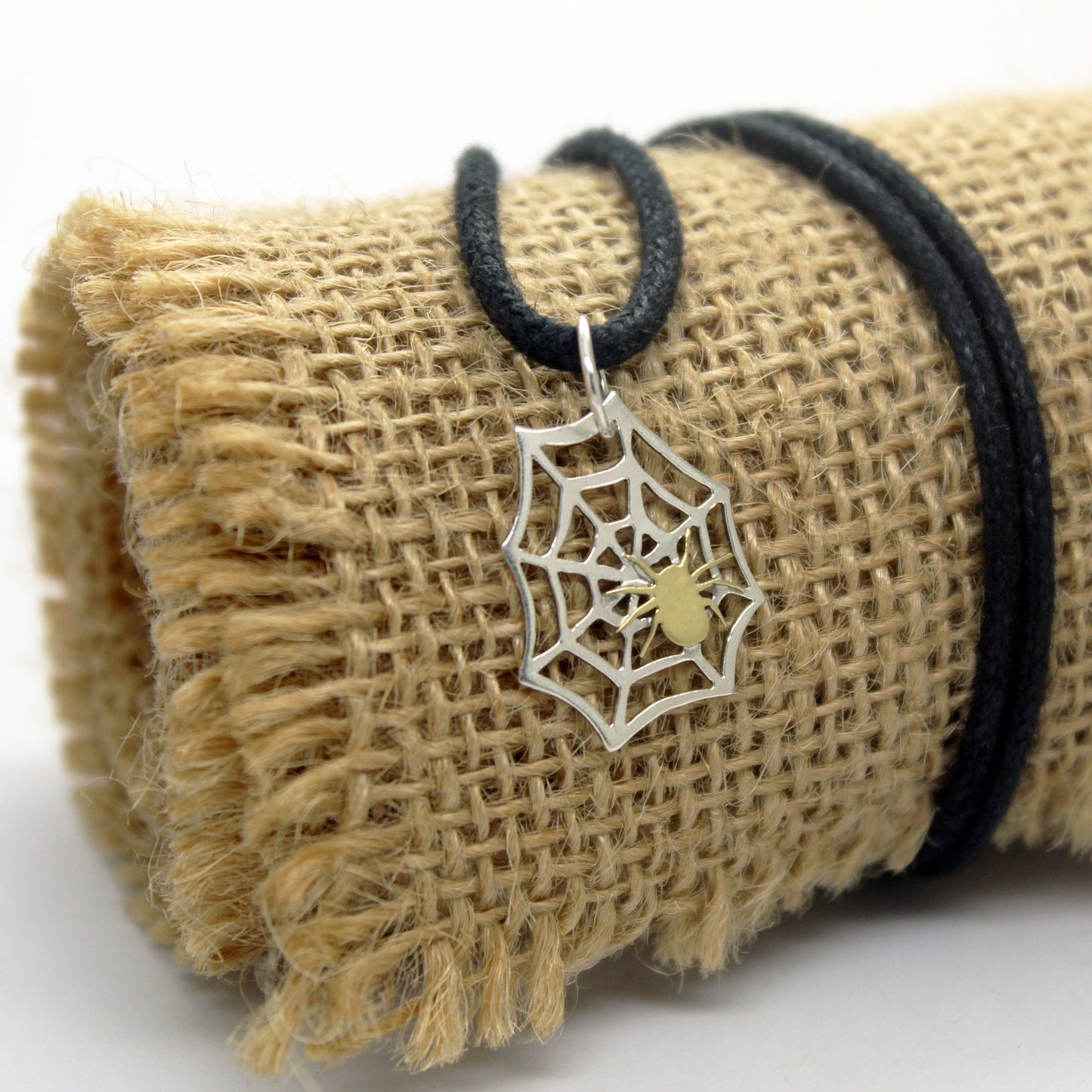 925 silver spider web pendant with brass spider