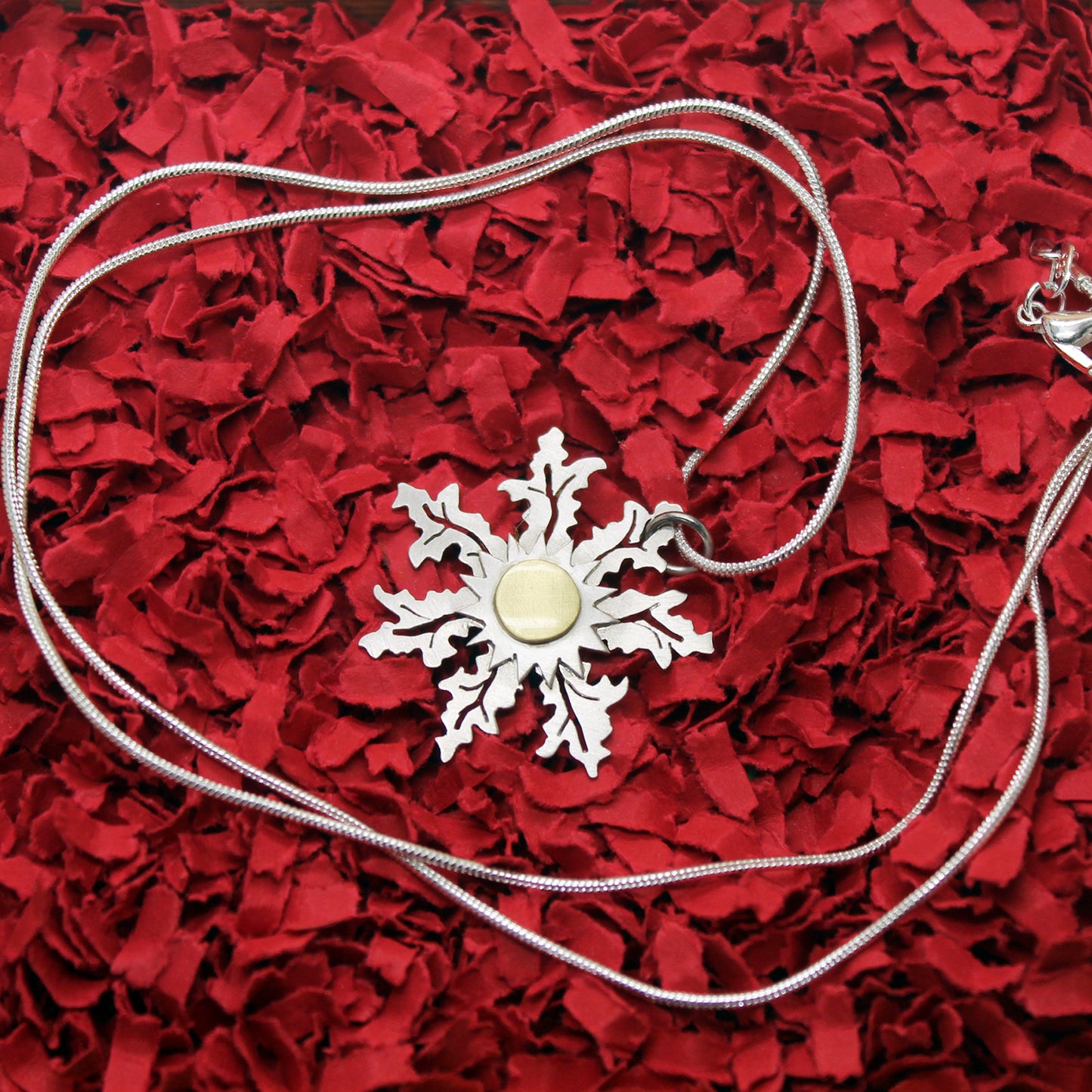 Eguzkilore pendant in 925 silver and brass