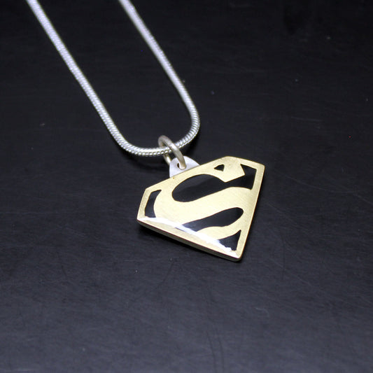 Colgante Superman / Supergirl en plata 925 y latón
