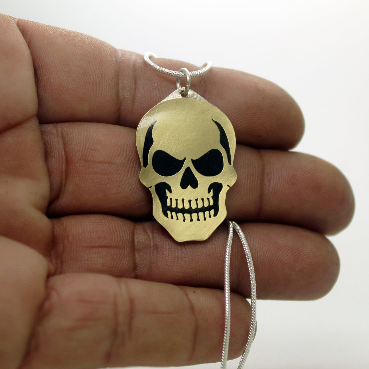 Colgante Calavera en latón y plata 925