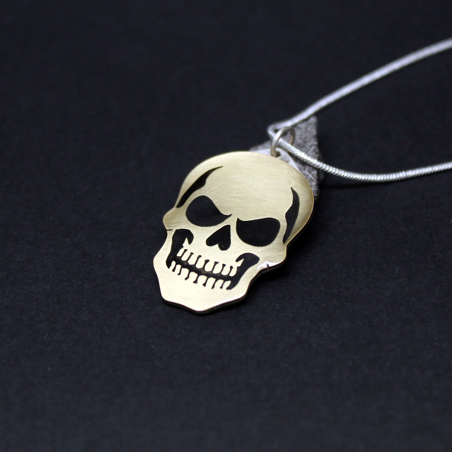Colgante Calavera en latón y plata 925