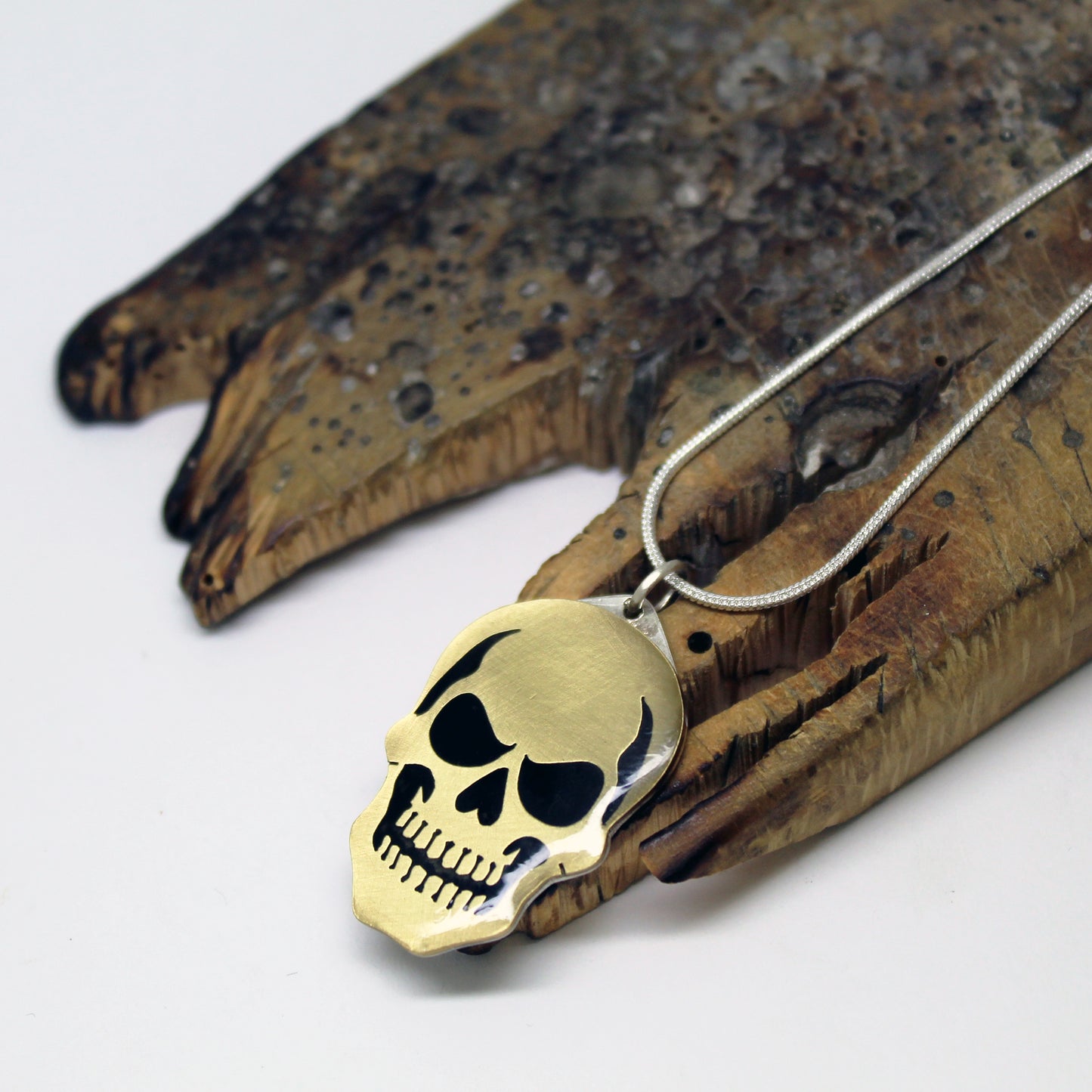 Colgante Calavera en latón y plata 925