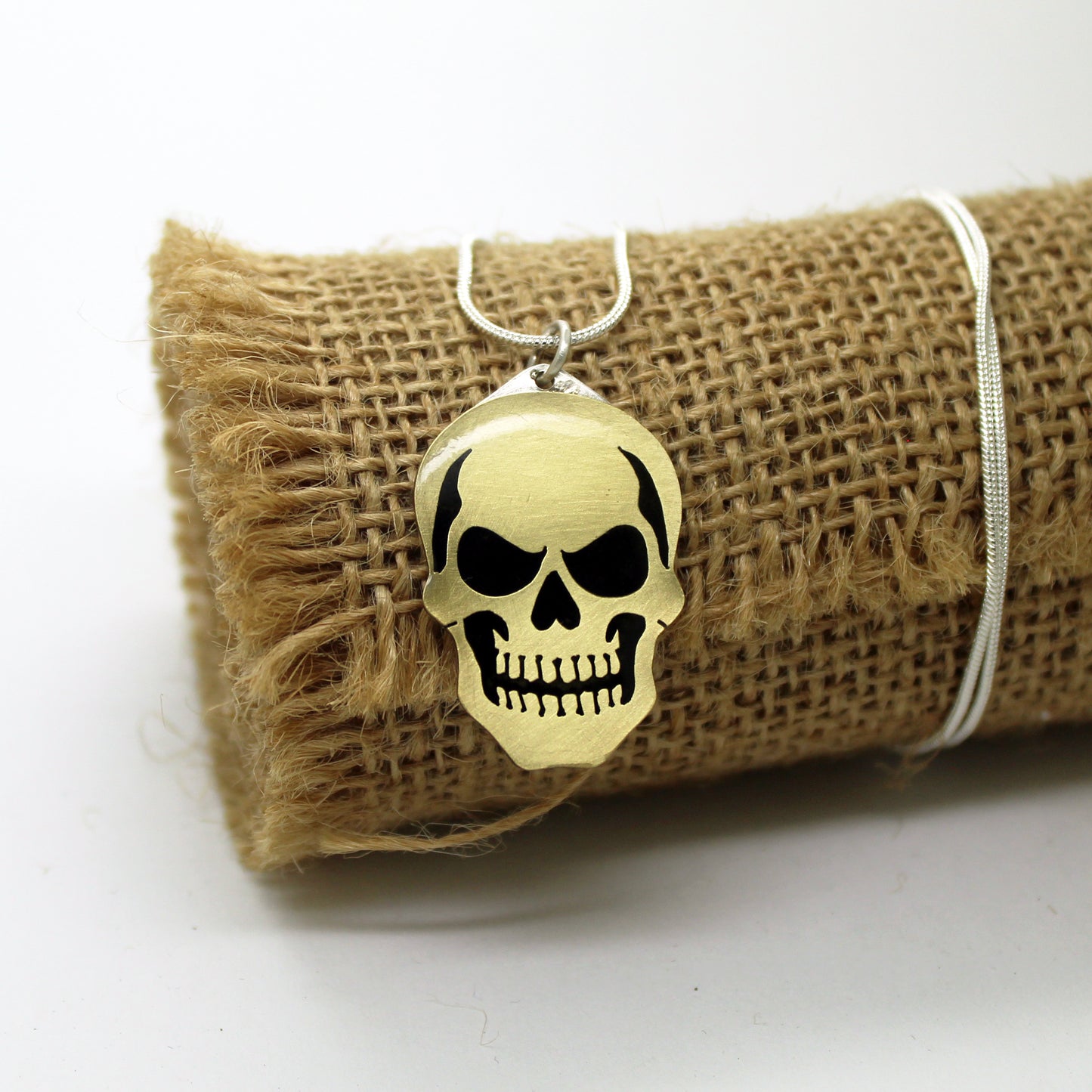 Colgante Calavera en latón y plata 925