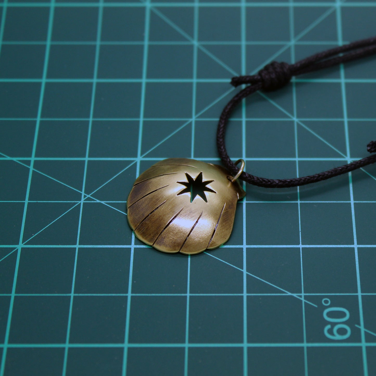 Shell of the Camino de Santiago with Lizarra Star, brass pendant