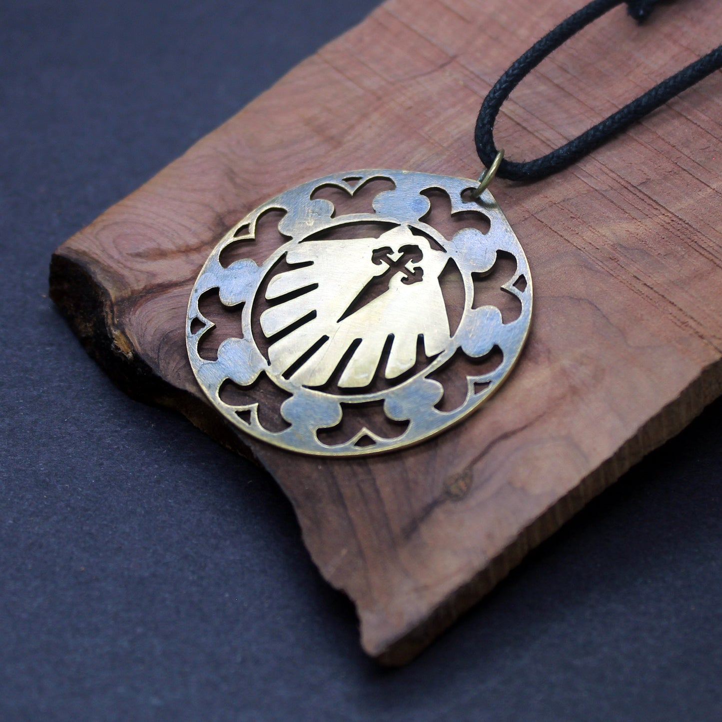 Shell medallion of the Camino and Cross of Santiago openwork in brass