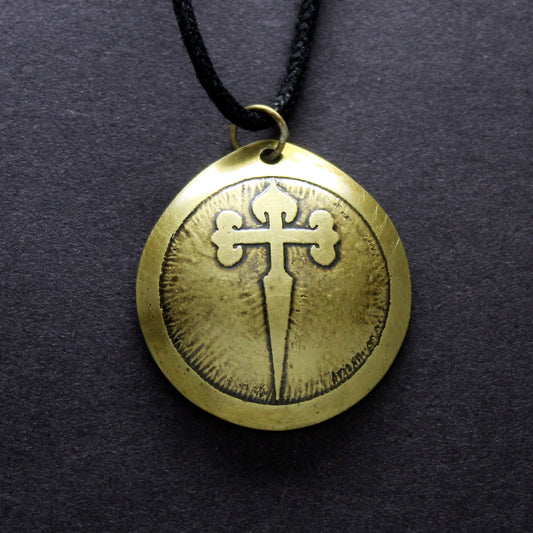 Brass pendant engraved with the Cross of Santiago