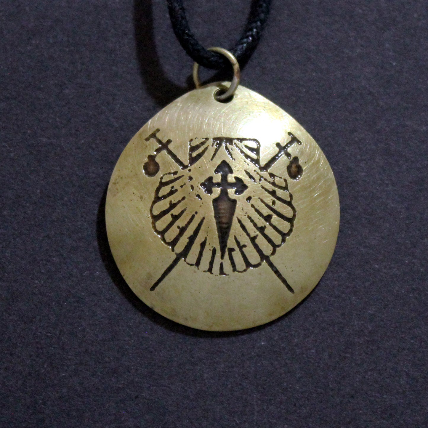 Symbols of the Camino de Santiago, convex brass pendant