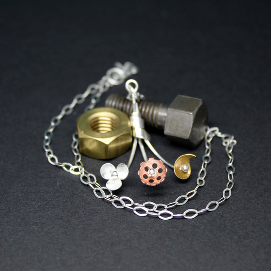 Susanne's Pendant in 925 silver, brass and copper