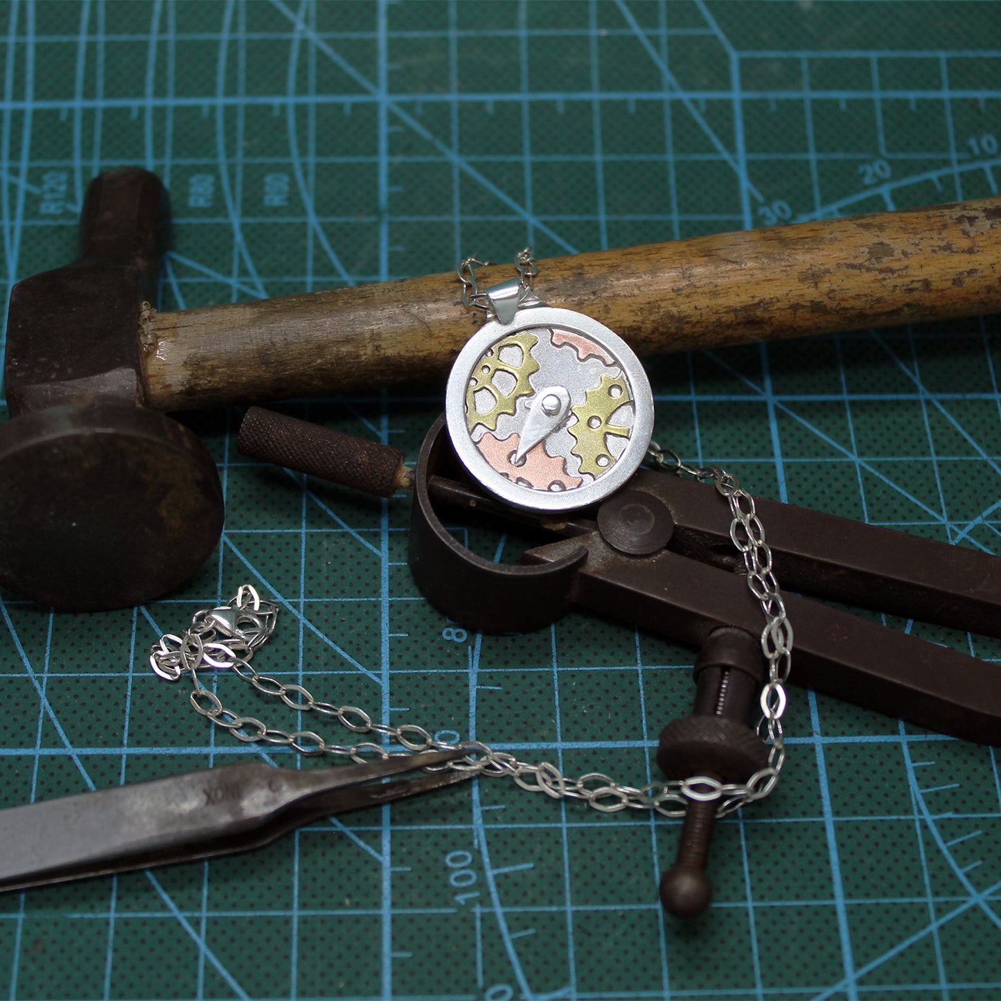 Fairy Compass pendant in 925 silver, brass and copper