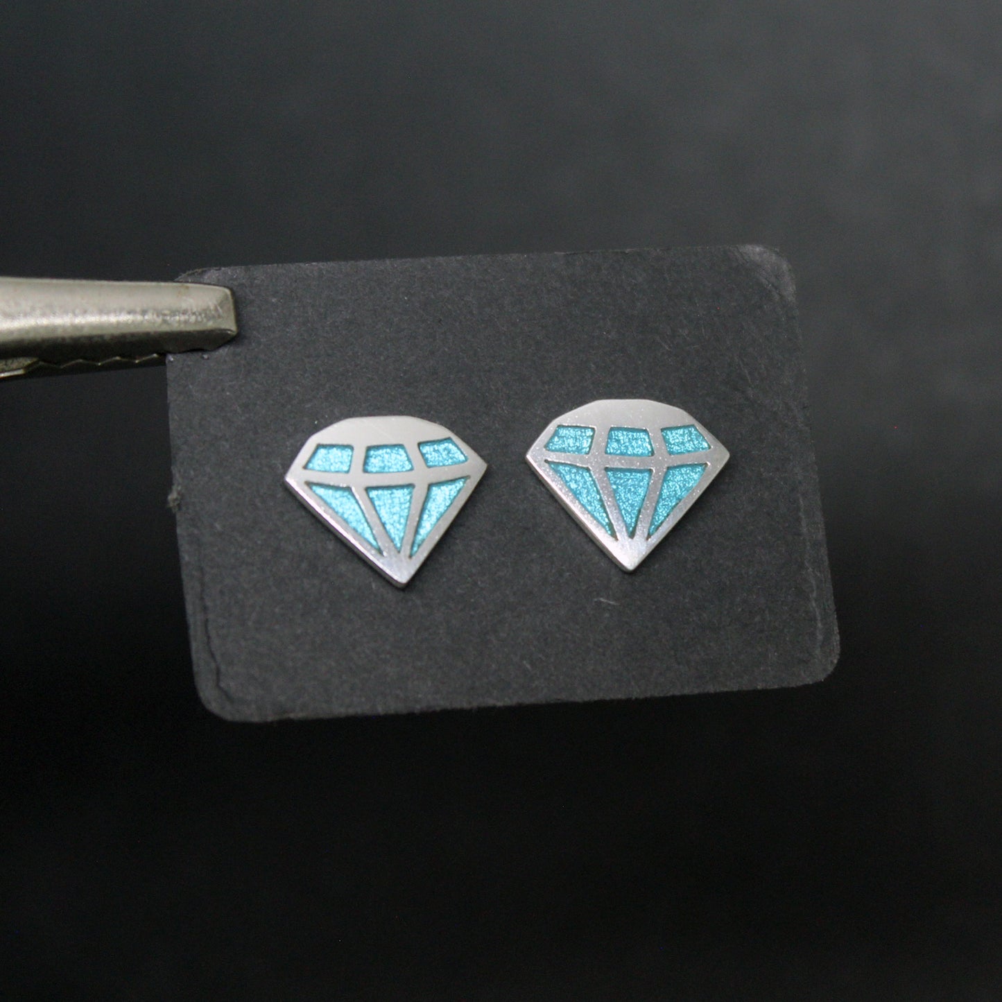 Blue diamonds earrings in 925 silver and UV resin