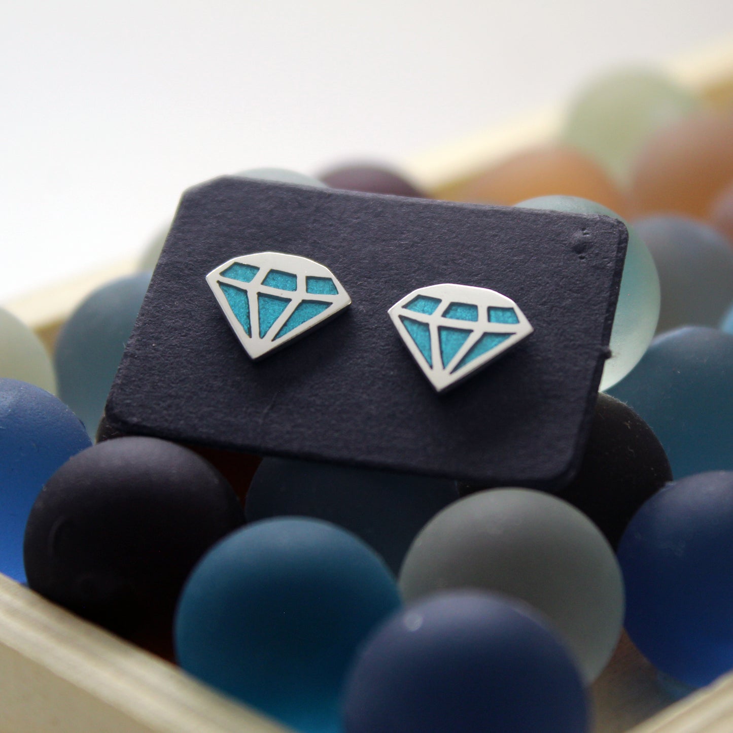 Diamantes azules pendientes de plata 925 y resina UV