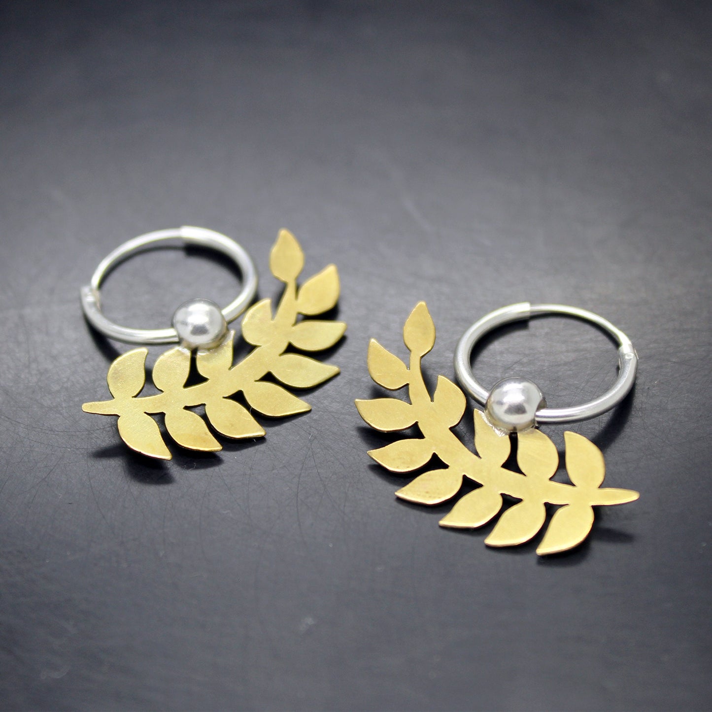 Spikes earrings in 925 silver and brass