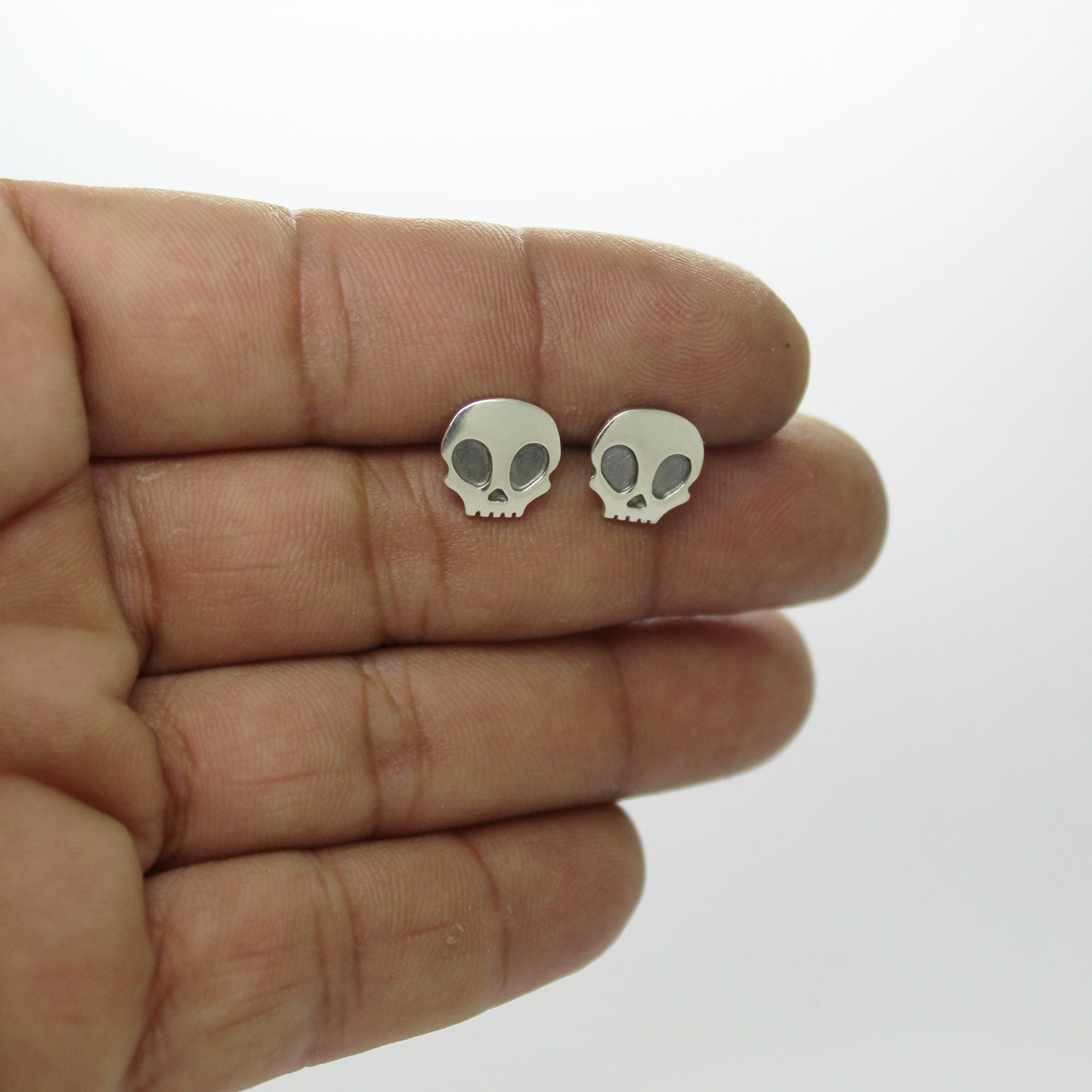925 silver skull earrings with patina